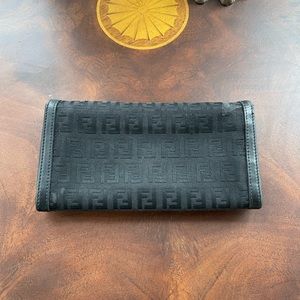 Fendi  wallet. 7 1/4 long x 4 inches. Clasp is weak, but closes.